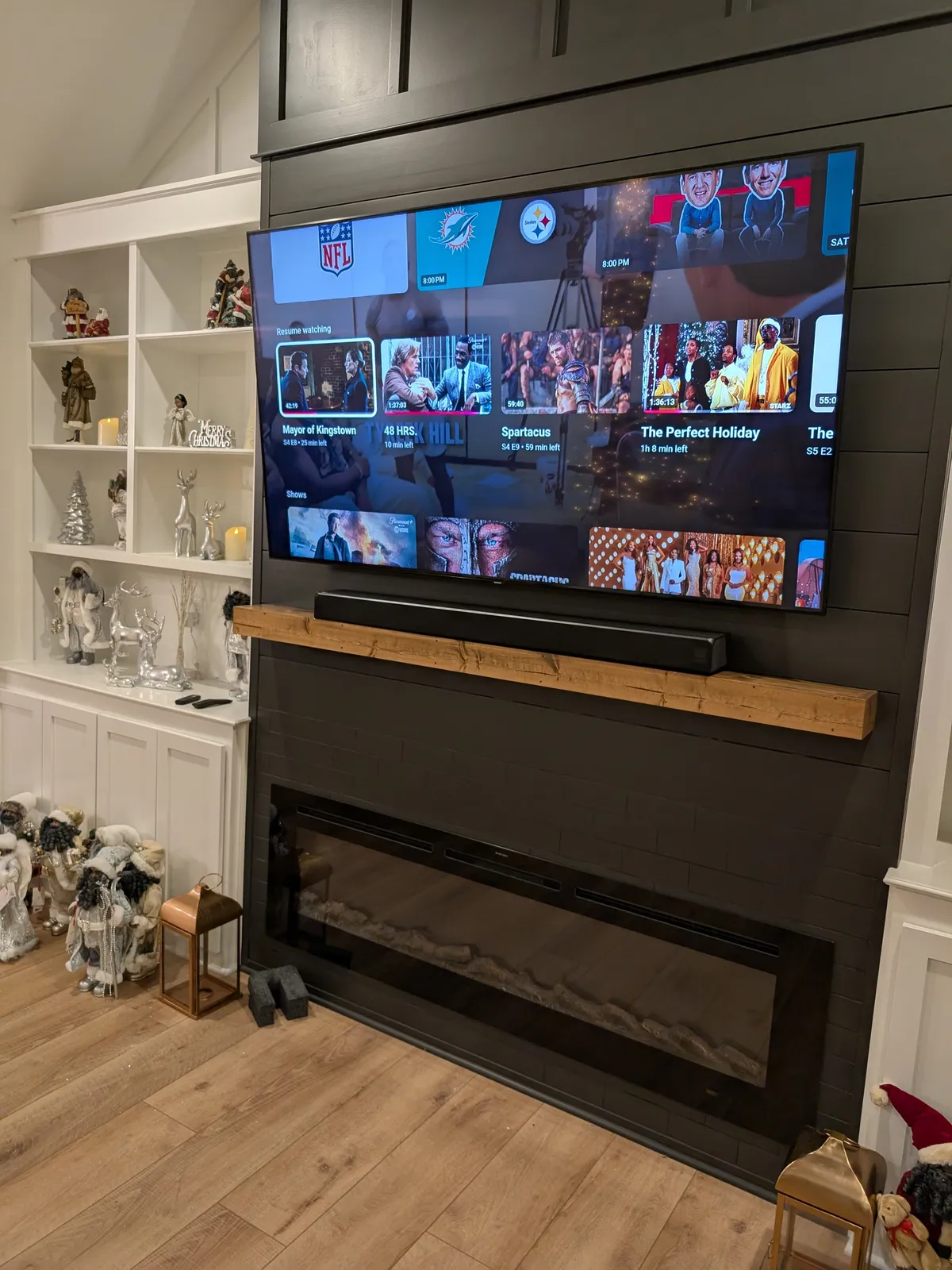 Fireplace TV mount on brick wall