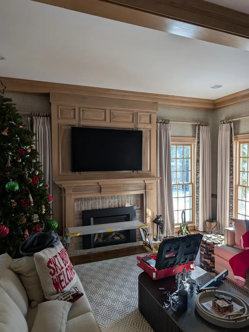 Samsung Frame TV installed on wood paneled mantel in Cherokee Garden Louisville