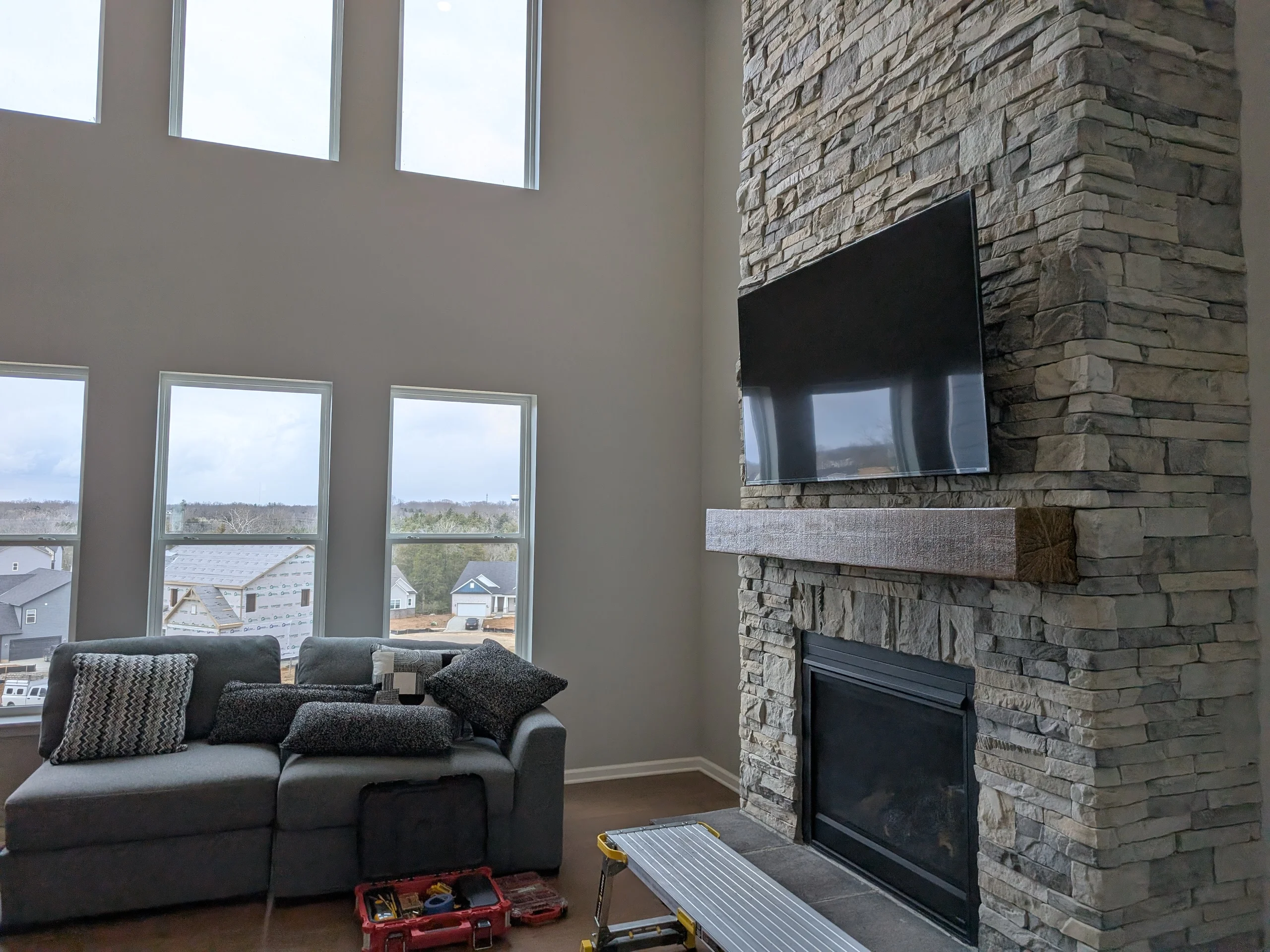 Stone fireplace TV mount complete installation Catalpa Farms Louisville KY