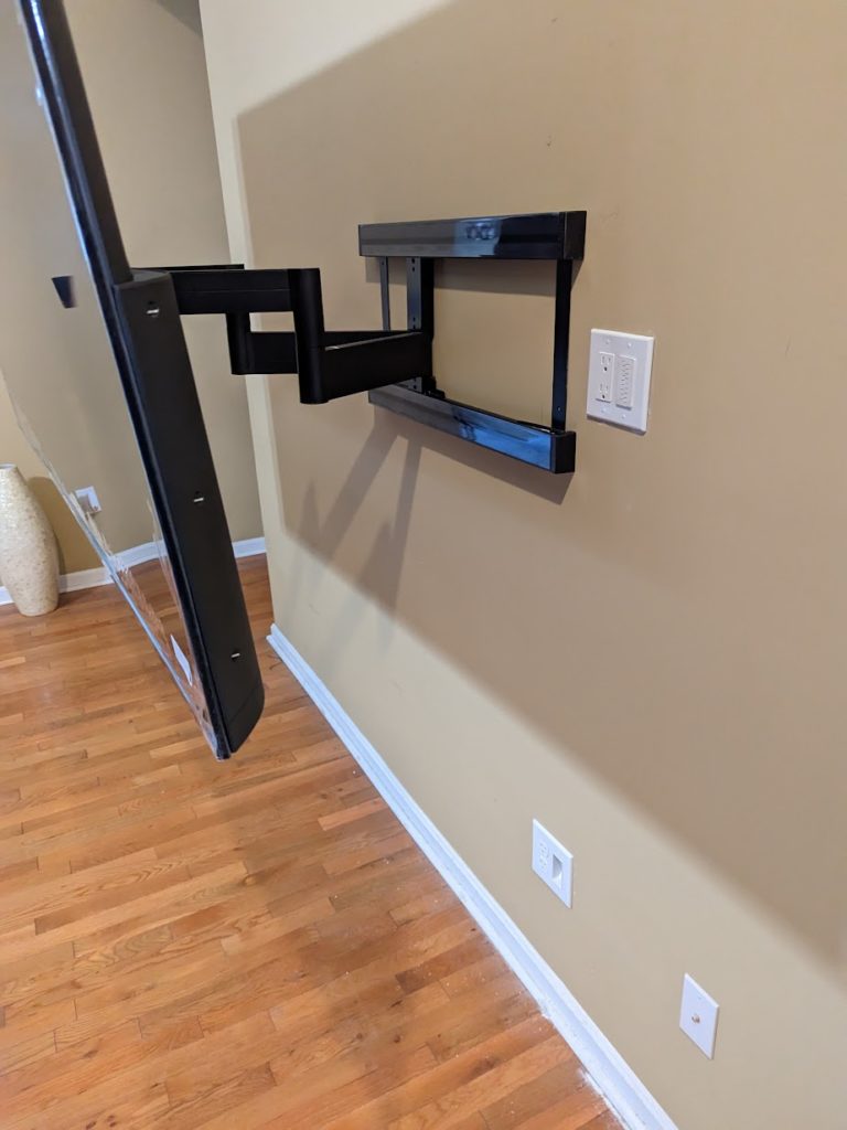 Professional TV Wire Concealment: Outlet Added Behind TV in Louisville, KY | TV Mounting Louisville Kentucky